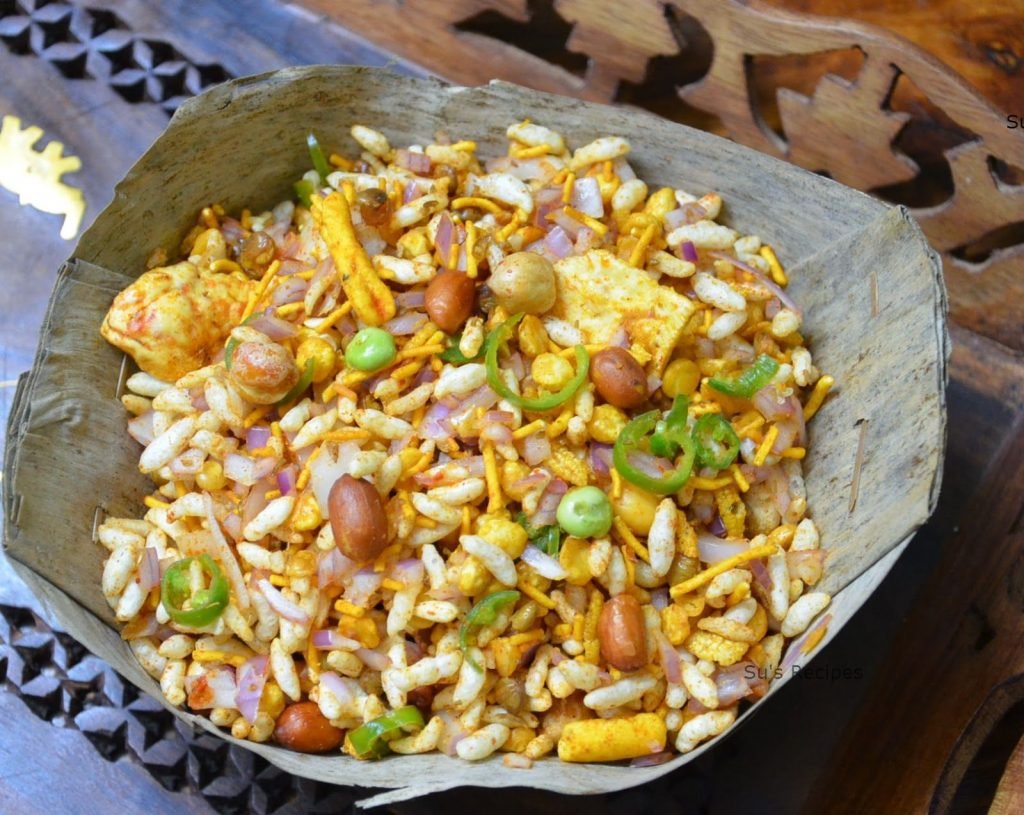 Jhal-muri is a type of mixture prepared with puffed rice , onions, chutney and other ingredients. A packet of Jhalmuri can cost Rs. 20 (average) through price differs according to places.